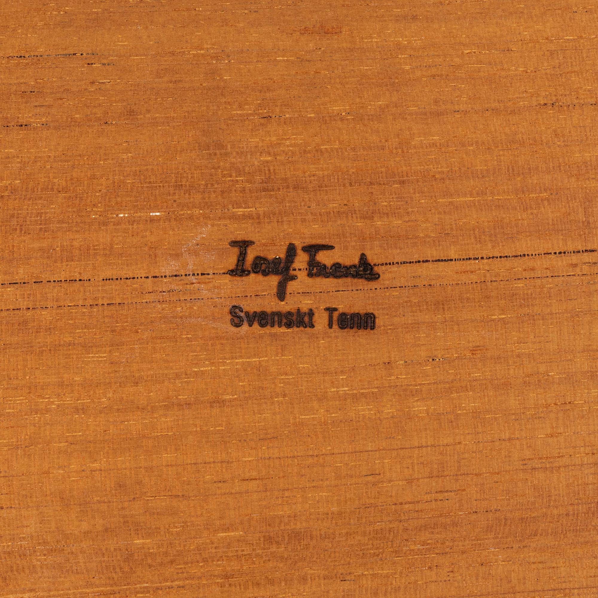 Josef Frank, a model 618 nesting table, post 1985.