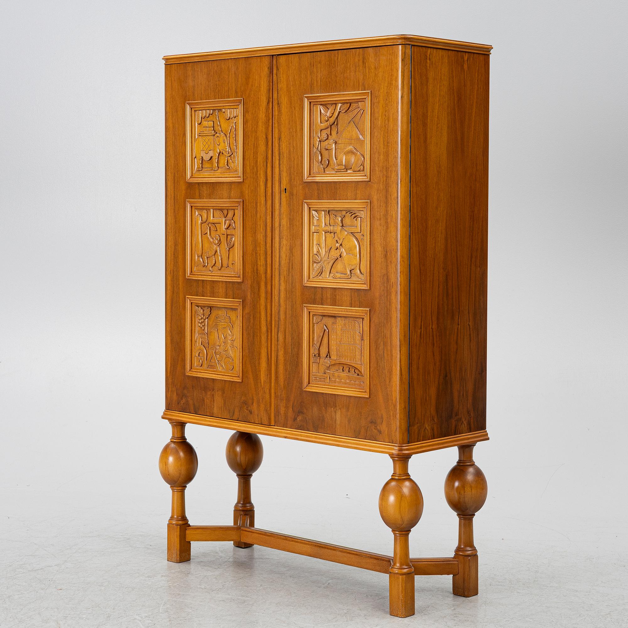 Eugen Höglund, a walnut cabinet, executed in his workshop in Vetlanda, Sweden 1950s.