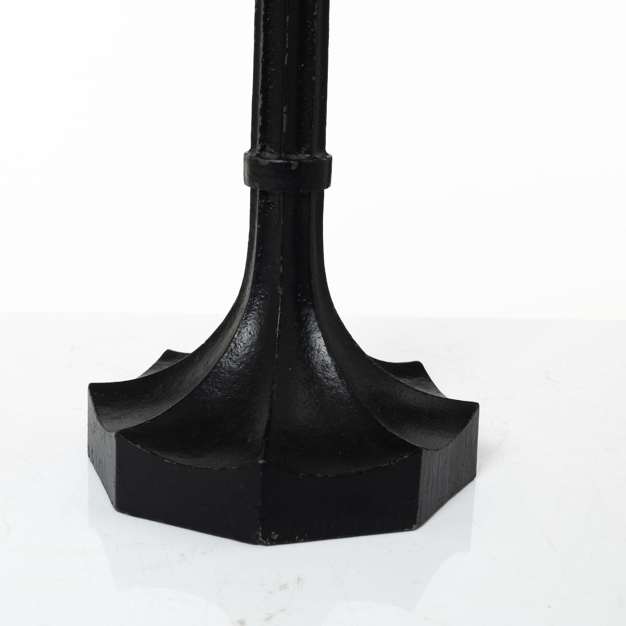 Sigurd Persson, a pair ofa cast iron candelabras, Kockums 1965.