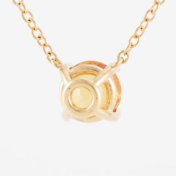 Necklace 18K gold with orange sapphire.
