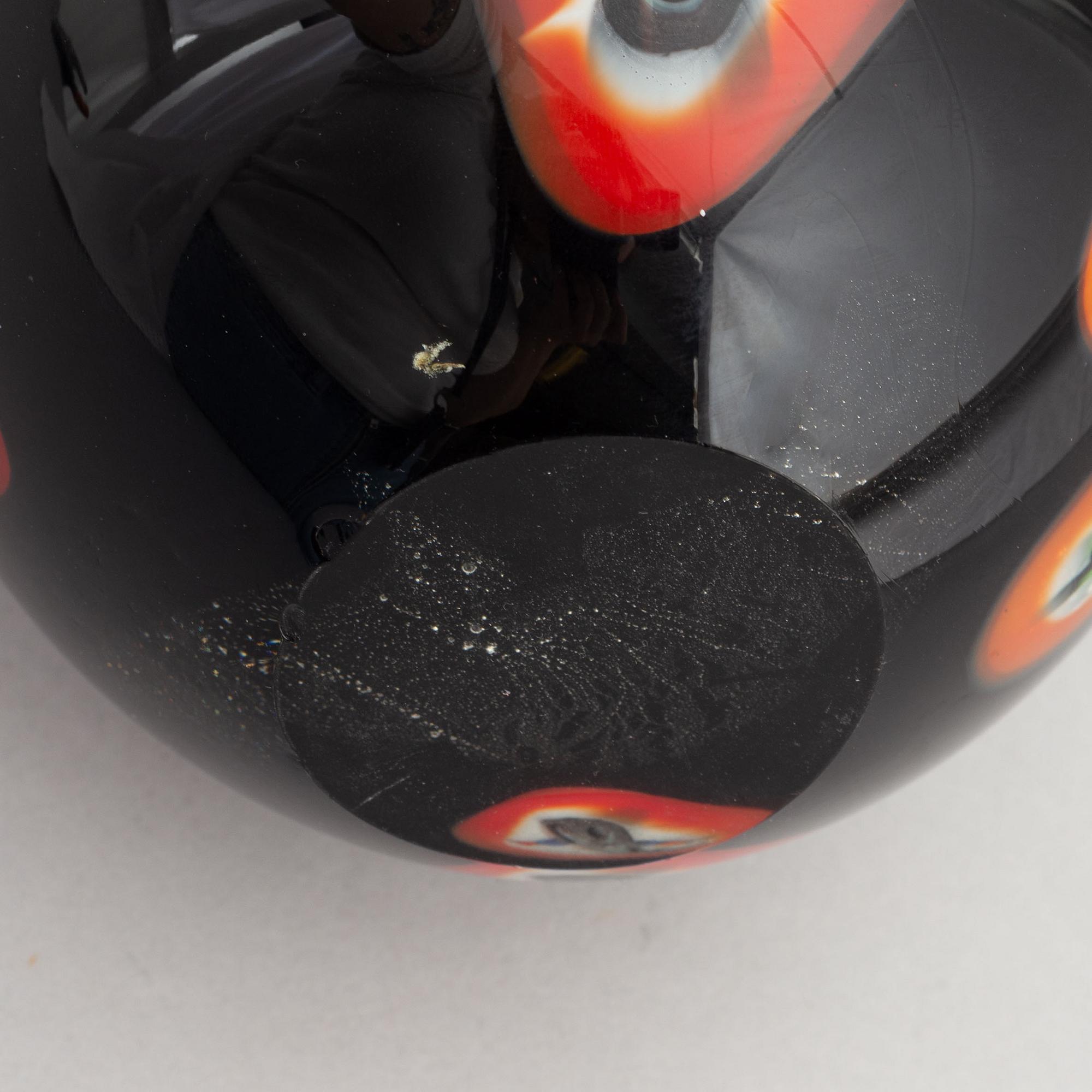 A black pear-shaped glass vase, possibly designed by Alfredo Barbini, Murano, Italy.