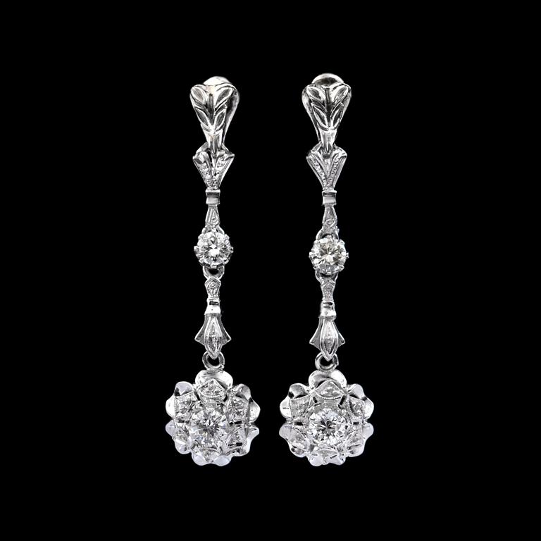 A pair of diamond earrings. Total carat weight circa 0.90 ct.