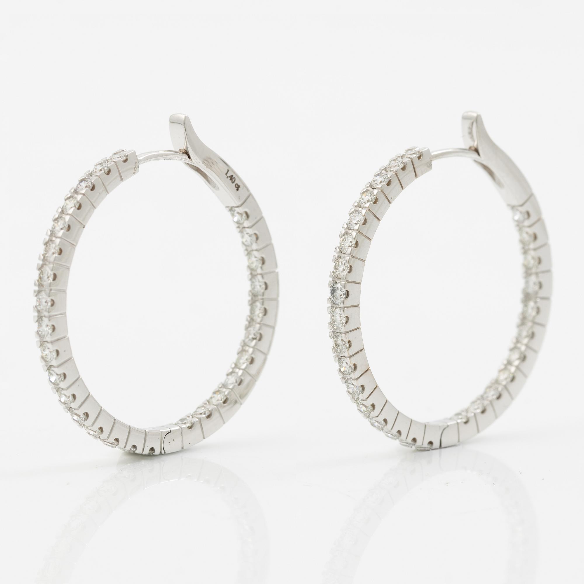 Earrings 18K white gold with brilliant-cut diamonds.