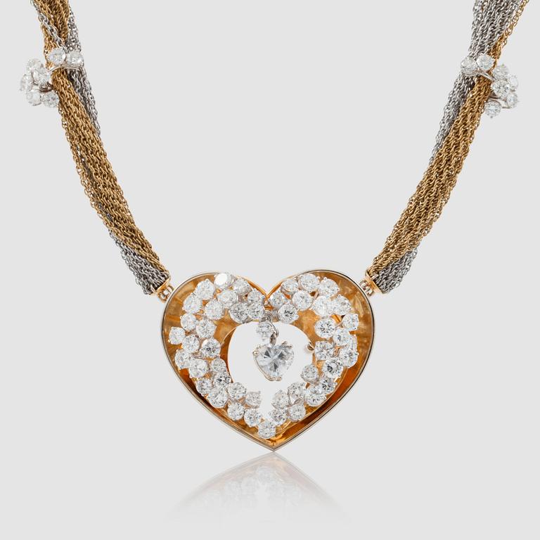 COLLIER, ett hjärta fyllt av diamanter mellan ihoptvinnade kedjor. Hjärtslipad diamant i mitten, ca 1.20 ct, E/SI.
