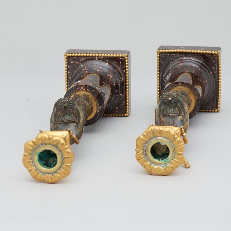 A pair of late Gustavian circa 1800 porphyry candlesticks.