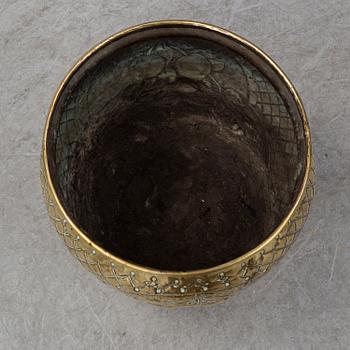 A 18th century brass flower pot.