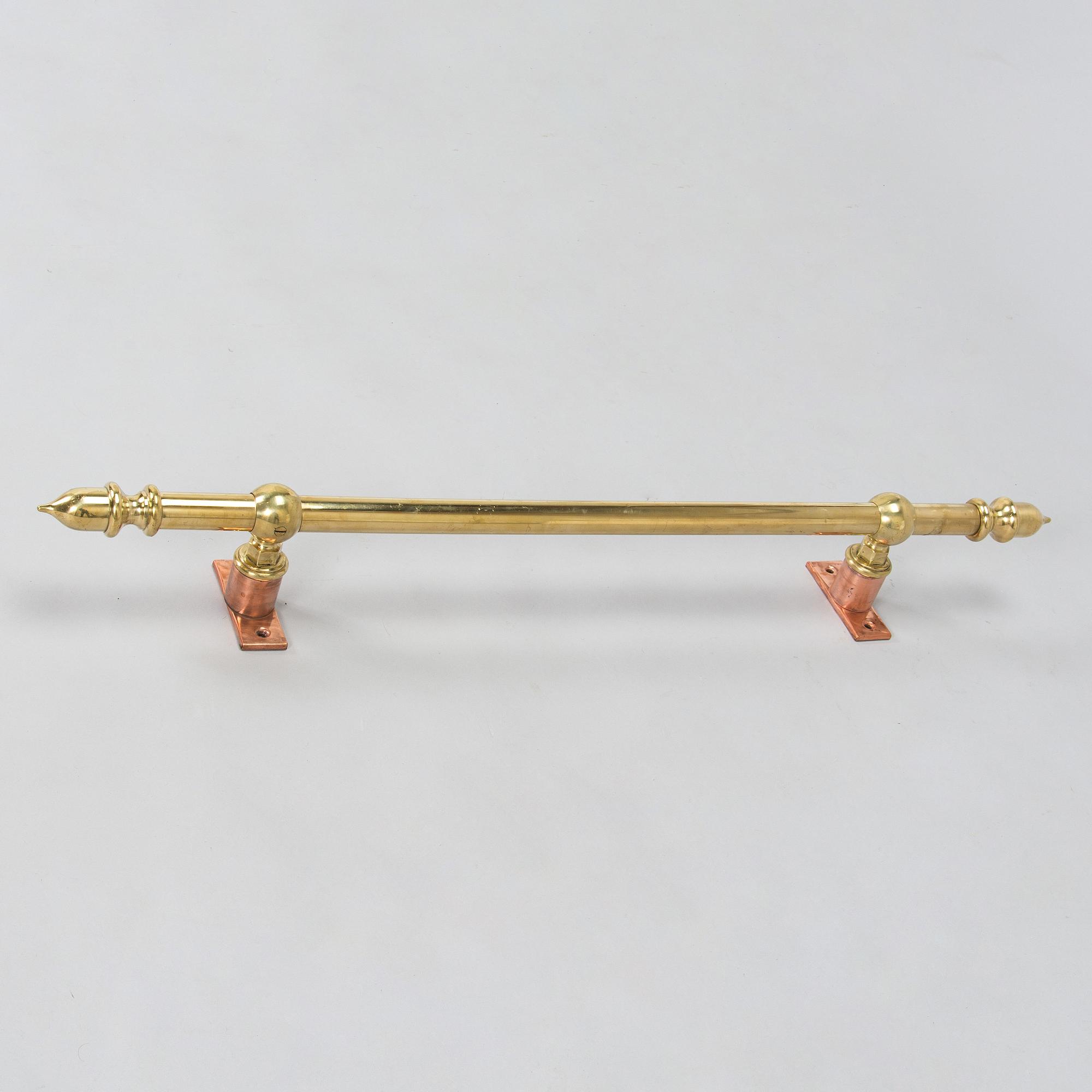 A late 20th century curtain rail / rod.