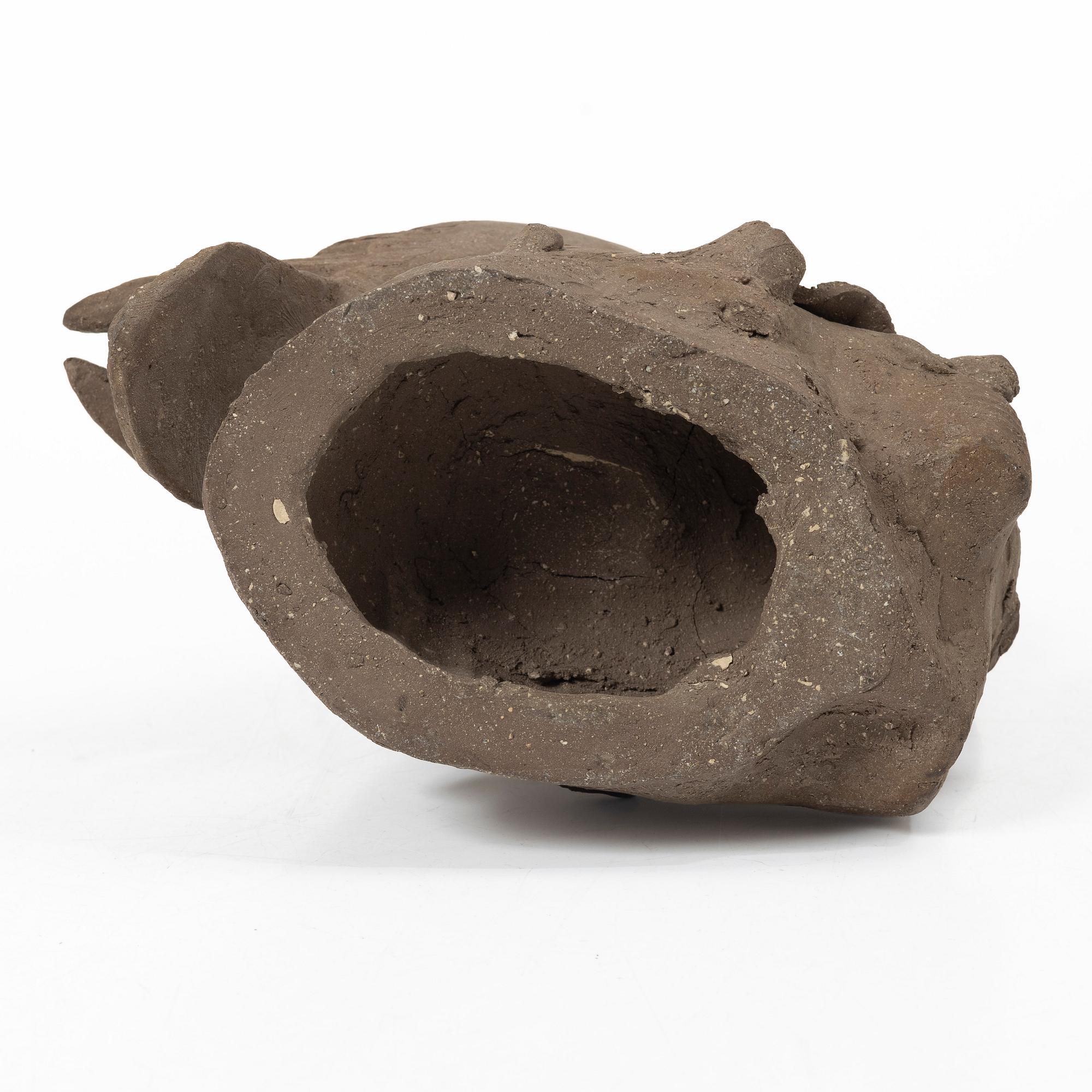 Tyra Lundgren, a stoneware sculpture of a woodpecker, executed in her own studio.