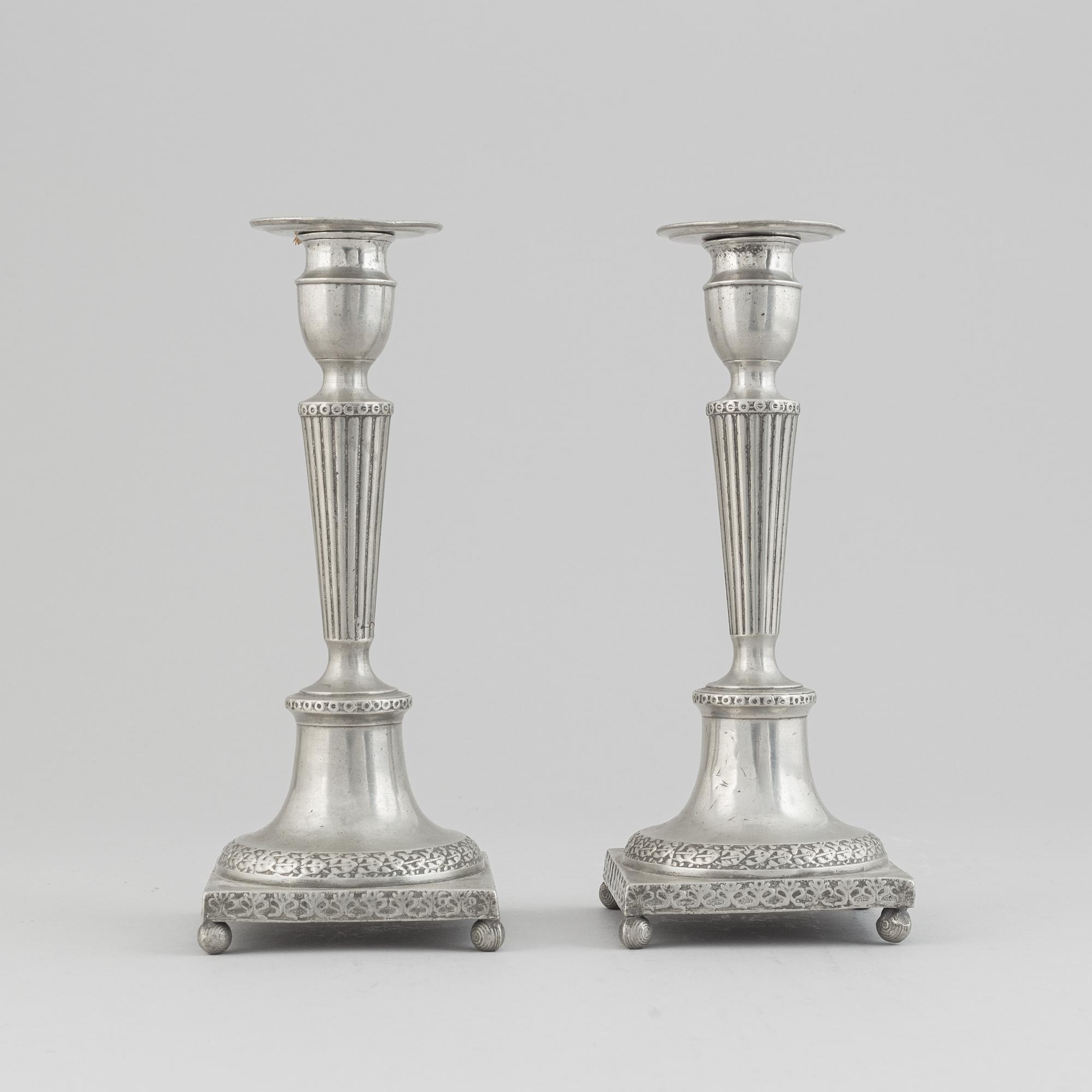 A pair of pewter candle stick by Anjou, Norrköping 1804.