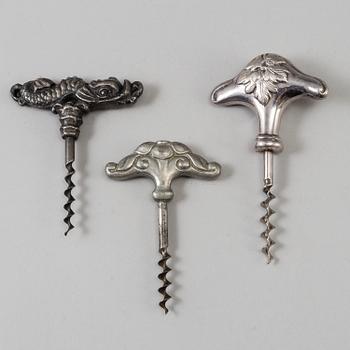 Three metal corkscrews, 1920/30.