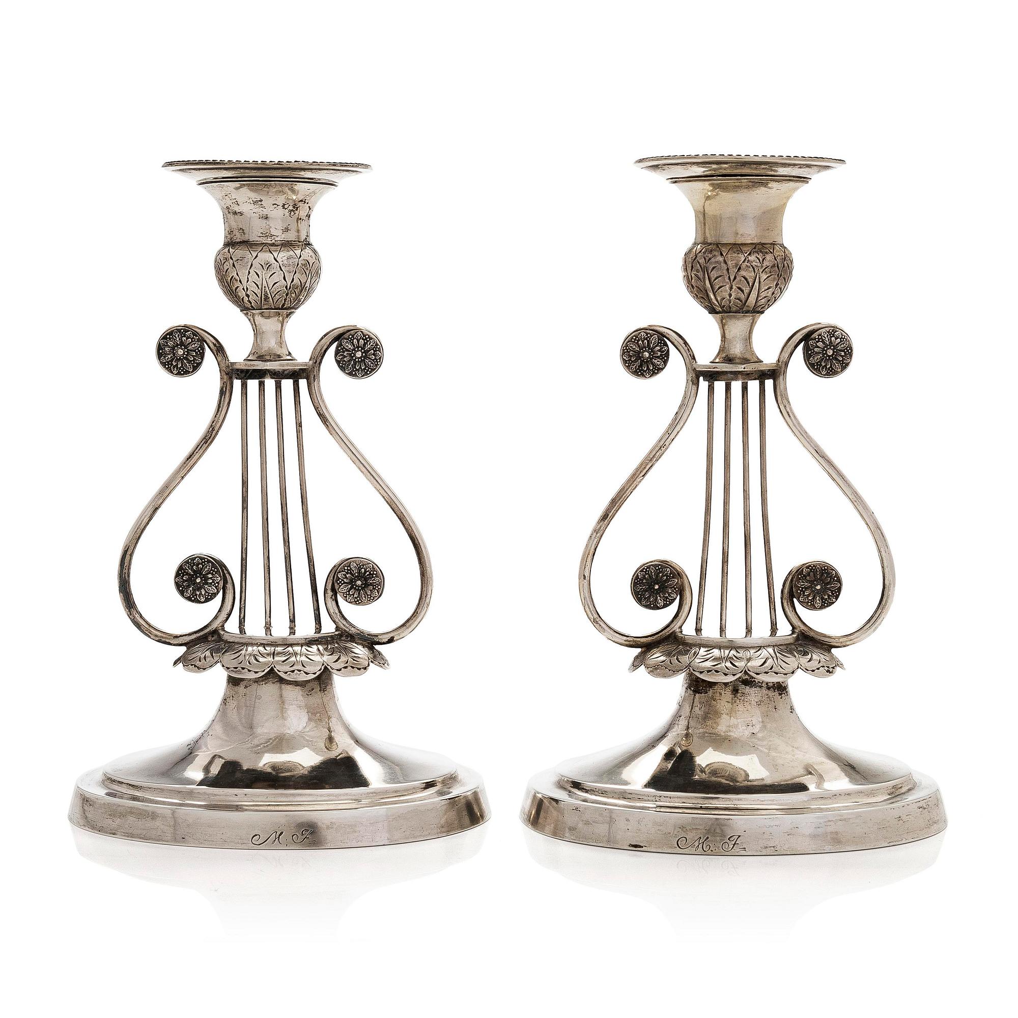 A pair of 19th-century silver candlesticks, maker's mark of Jacob Herman Lundström, Kuopio, 1823.
