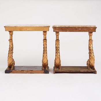 A matched pair of Swedish Empire console tables, first half of the 19th century.