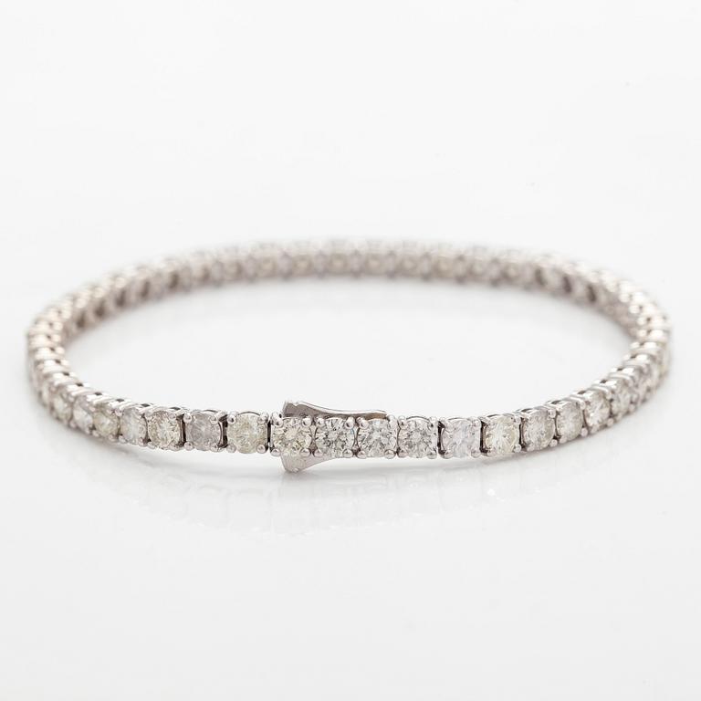 Tennis bracelet, brilliant cut diamonds, 14K white gold.