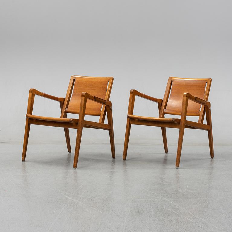 Axel Larsson, A pair of Swedish Bodafors armchairs, mid 20th century.