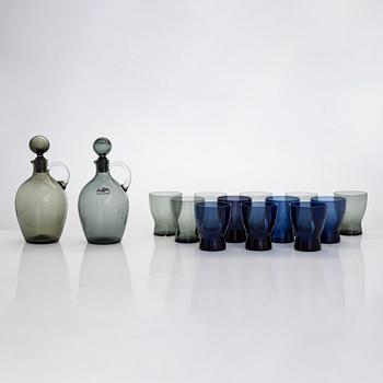 Saara Hopea, two glass carafes and twelve drinking glasses, Nuutajärvi, Finland. Design years 1959 and 1958.
