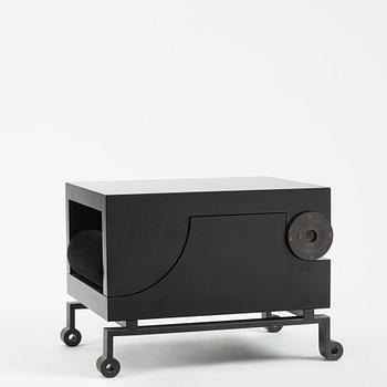 Alexander H Damsbo & Henrik Ingemann Nielsen, a "HC-Andersen Chair" armchair/table, ed. 3/49, Källemo, post 2005.