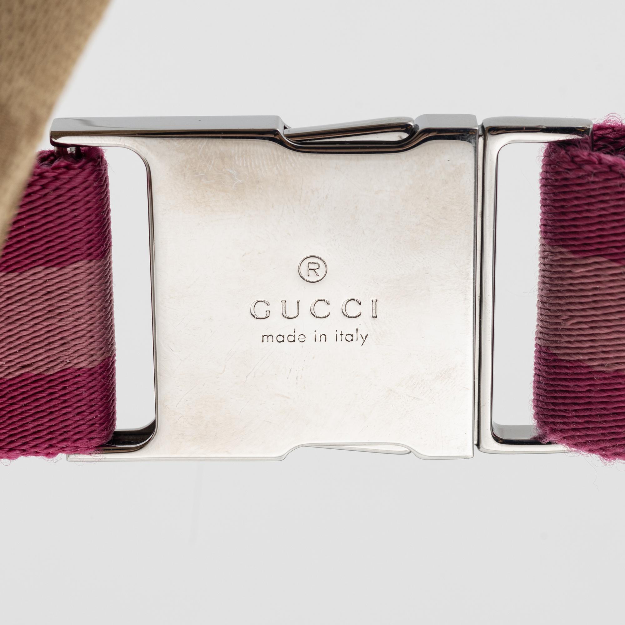 Gucci, a canvas beltbag.