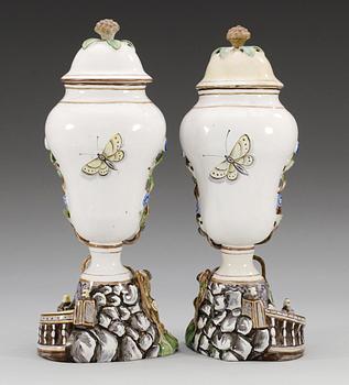 A pair of Marieberg faience vases with covers, 18th Century. (2).