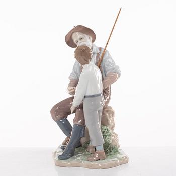 Lladro, two figurines, Salvador Furió, "A fishing lesson", and José Puché, "Fishing with gramps", Spain.