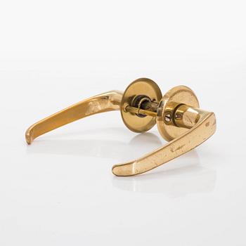 A set of six 1960s-70s door handles.