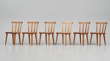 Axel Einar Hjorth, a set of six "Utö" stained pine chairs, Nordiska Kompaniet 1930s.