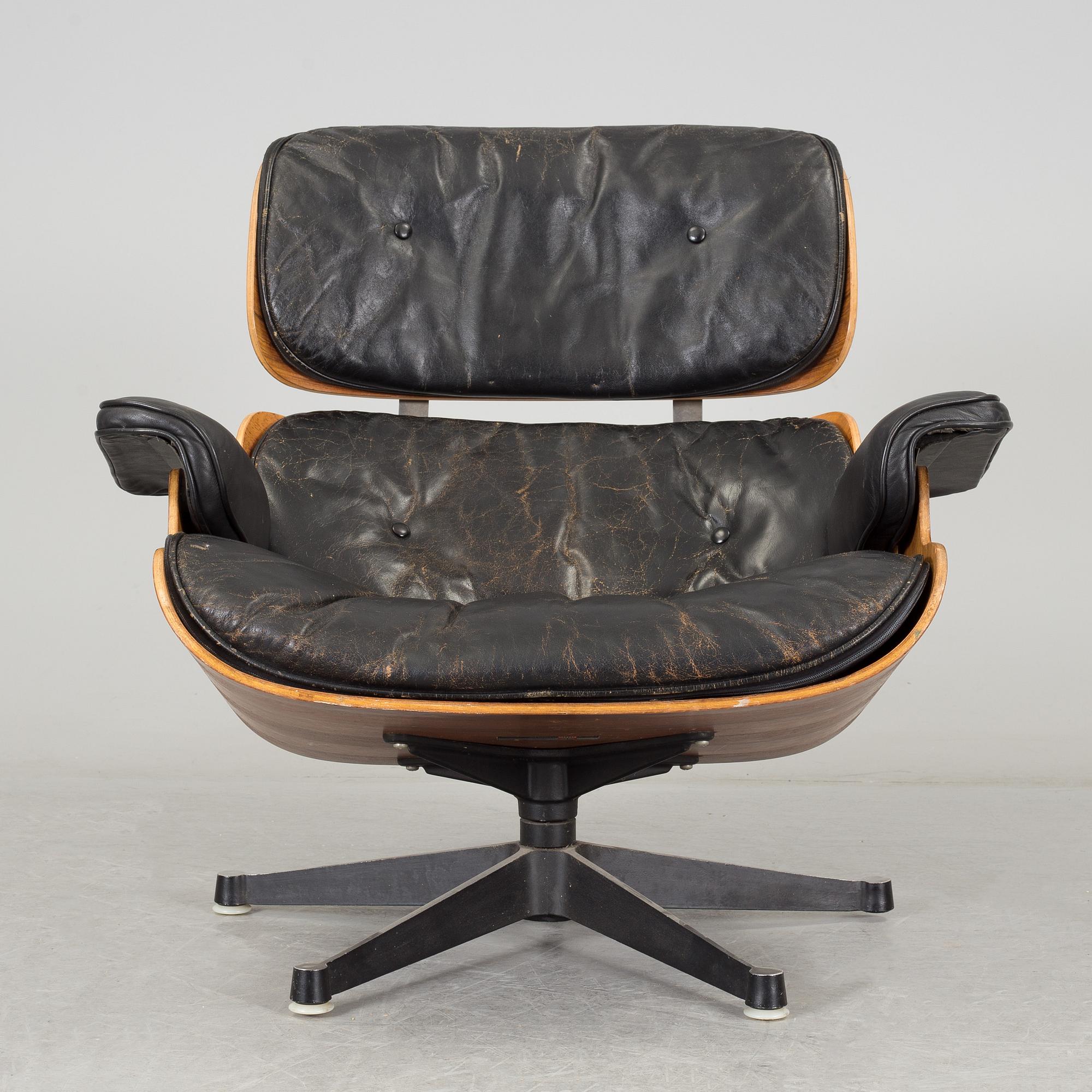An easy chair and ottoman by Charles & Ray Eames, Herman Miller, USA, produced with licence by Hille, London.