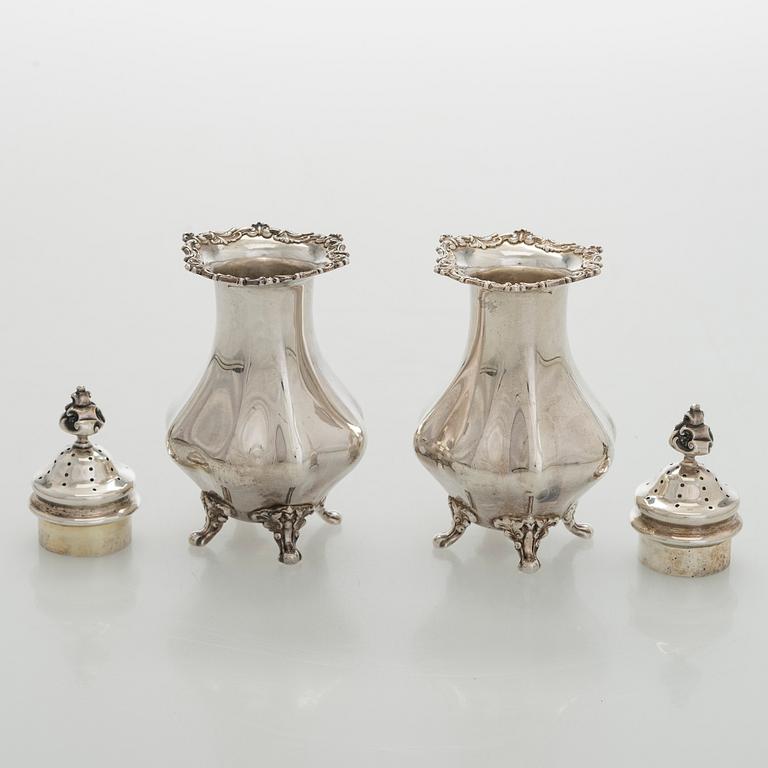 Black Starr & Frost, a pair of sterling silver shakers and sugar bowls, USA around 1900, Gorham pair of sterling spoons.