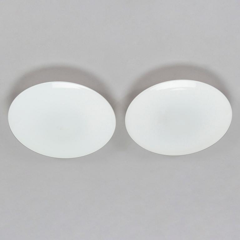 Arne Jacobsen, taklampor/ vägglampor, ett par, "AJ-Eklipta", Louis Poulsen, Danmark.