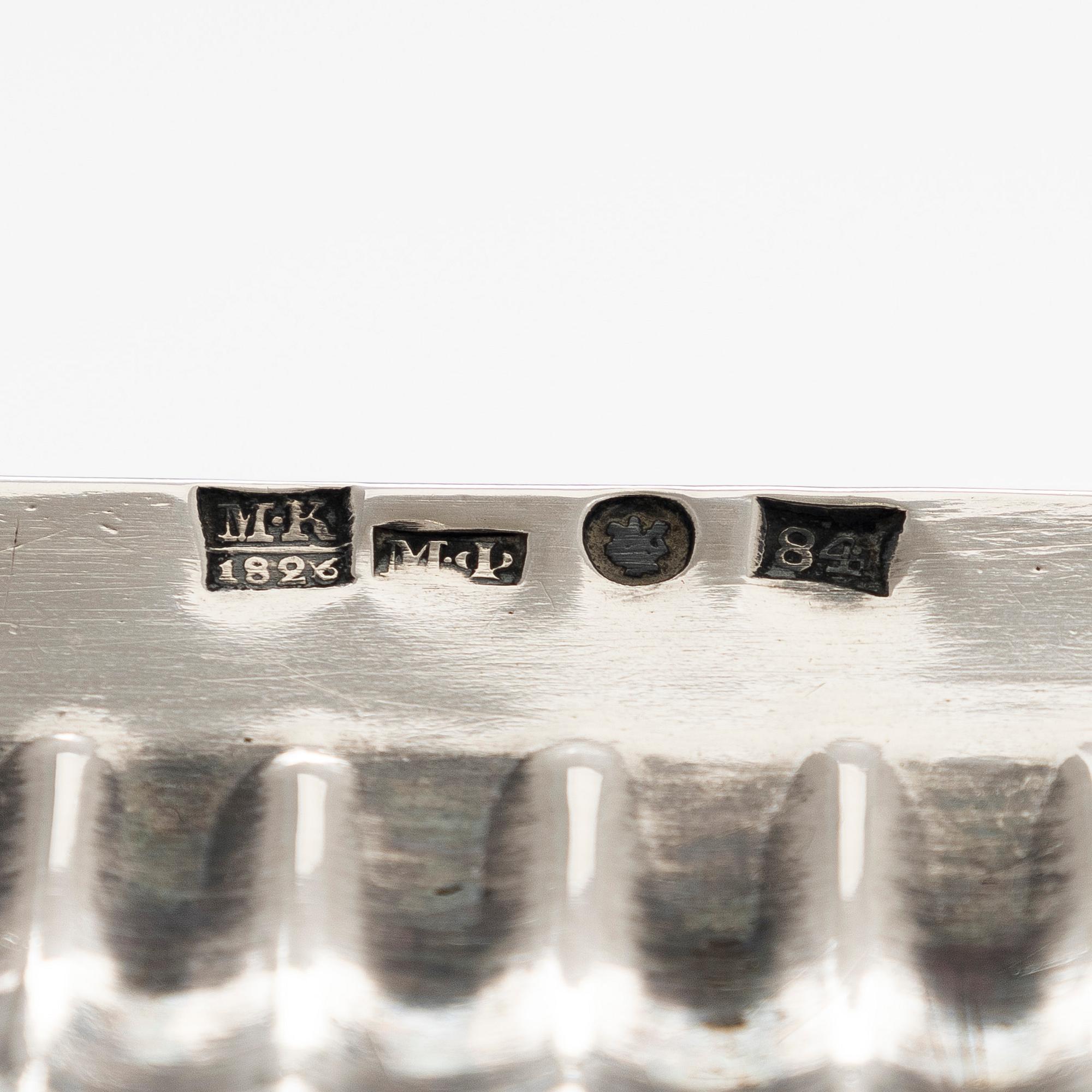 A silver tray, Saint Petersburg 1826. Unidentified maker's mark, Cyrillic M.F.