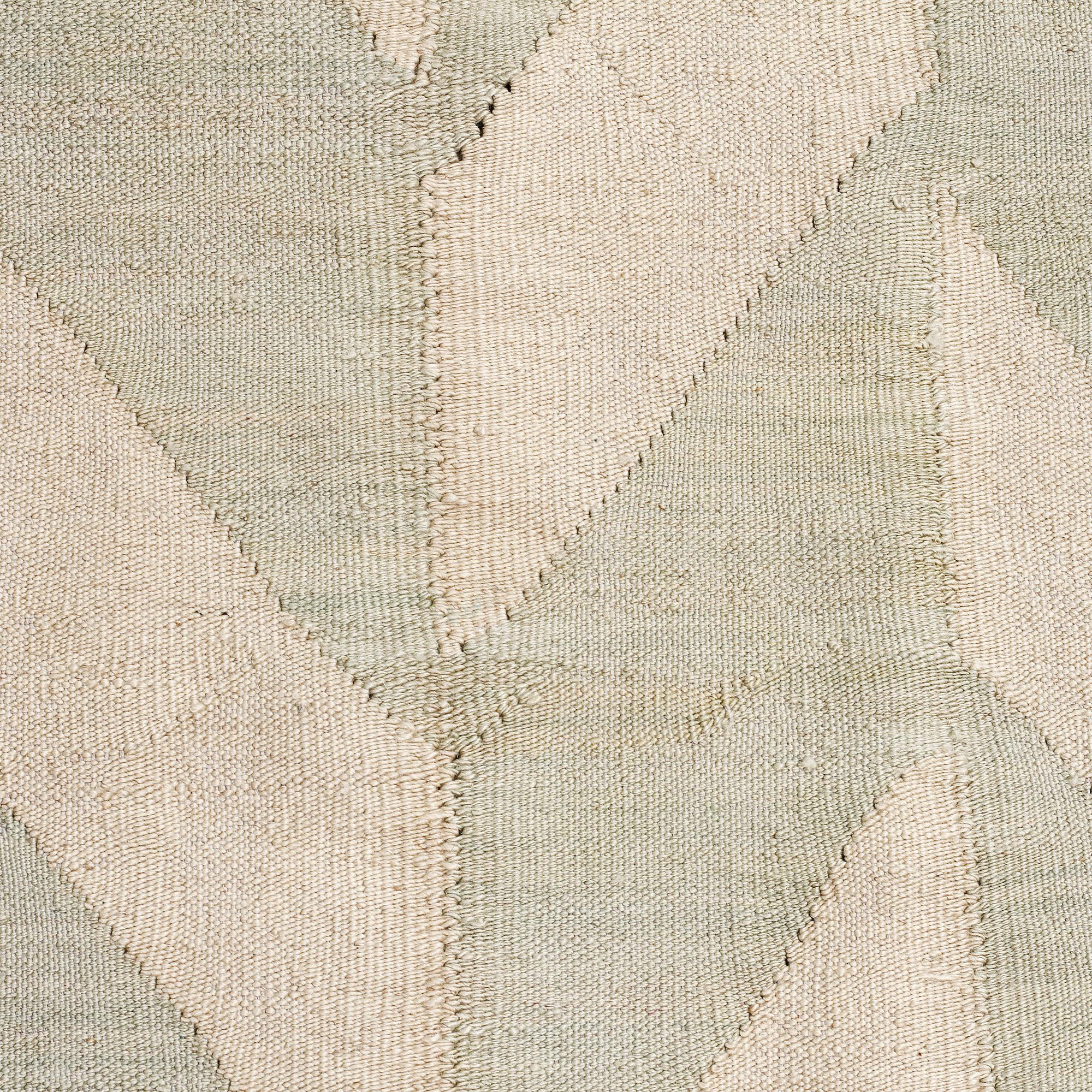A flatweave rug, 307 x 250 cm.