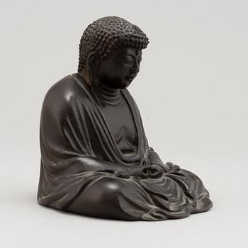 A Japanese seated bronze okimono of Amitabha buddha, 20th century.