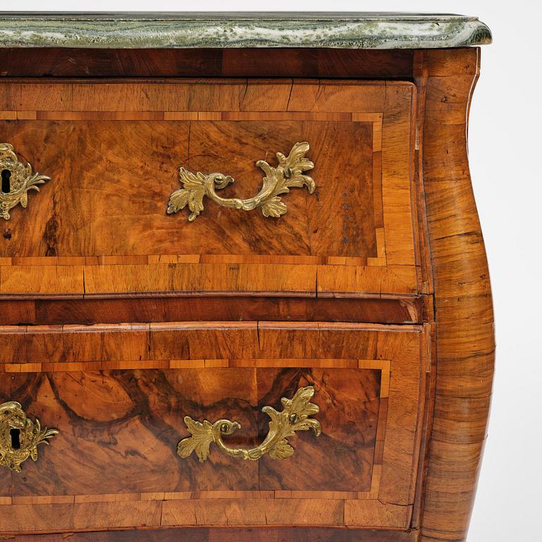 A Swedish rococo parquetry commode by C. Linning (master in Stockholm 1744-79).