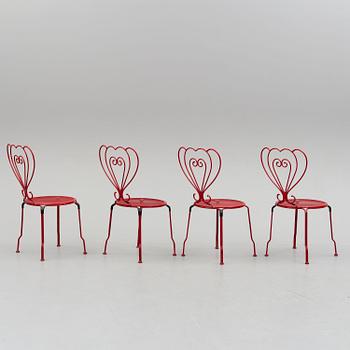 GARDEN FURNITURE, a table and four chairs, late 20th century.