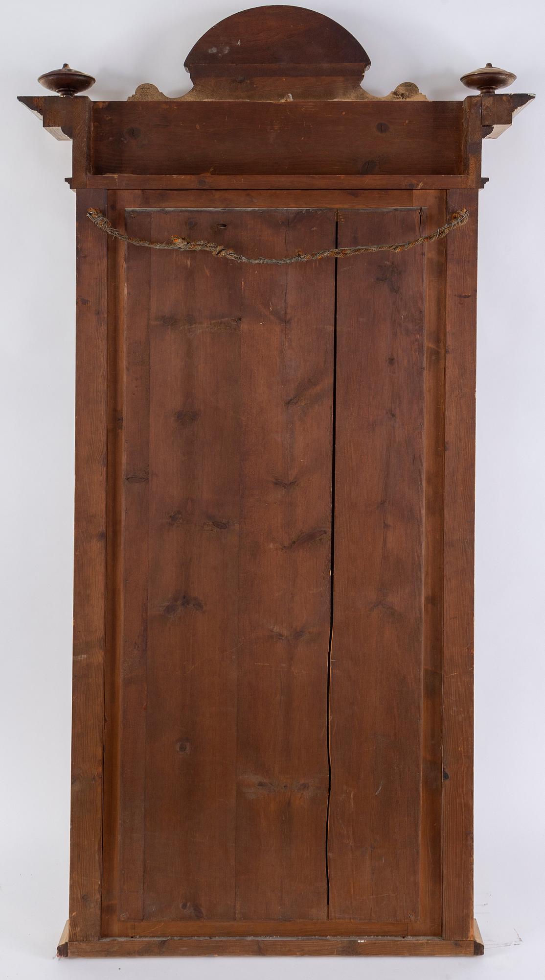 An end of the 19th Century rennaisance style bronzed mirror-.