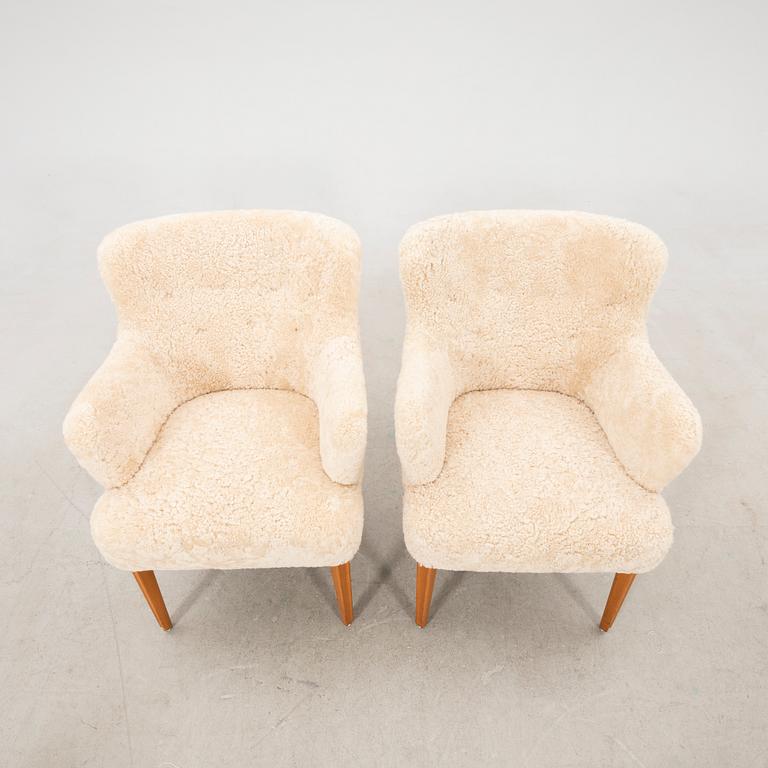 Armchairs, a pair from the 1950s.