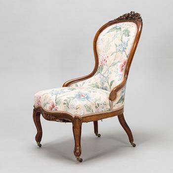 A late 19th century armchair in Rococo style.