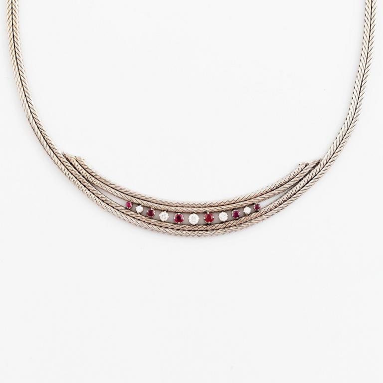 An 18 white gold necklace set with round brilliant-cut diamonds and rubies.