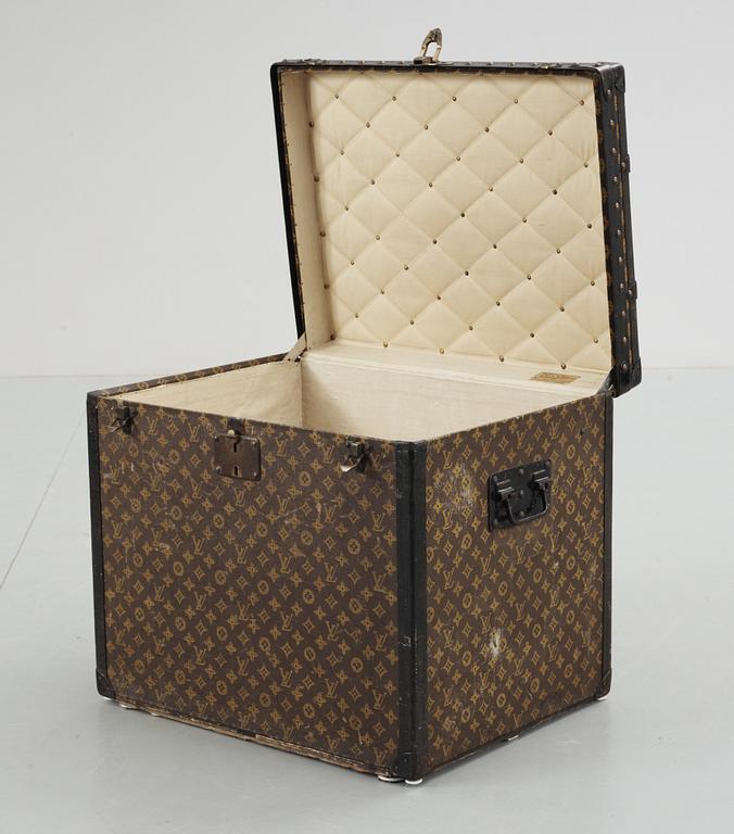An early 20th cent monogram canvas trunk by Louis Vuitton.