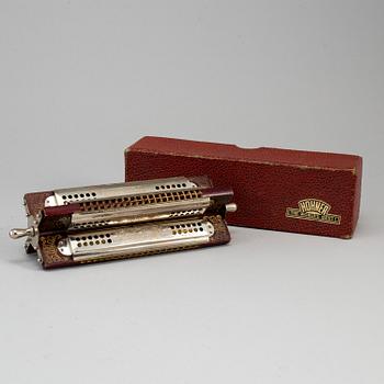 An harmonica, M Hohner, Tremolo Harmonica, 20th century.