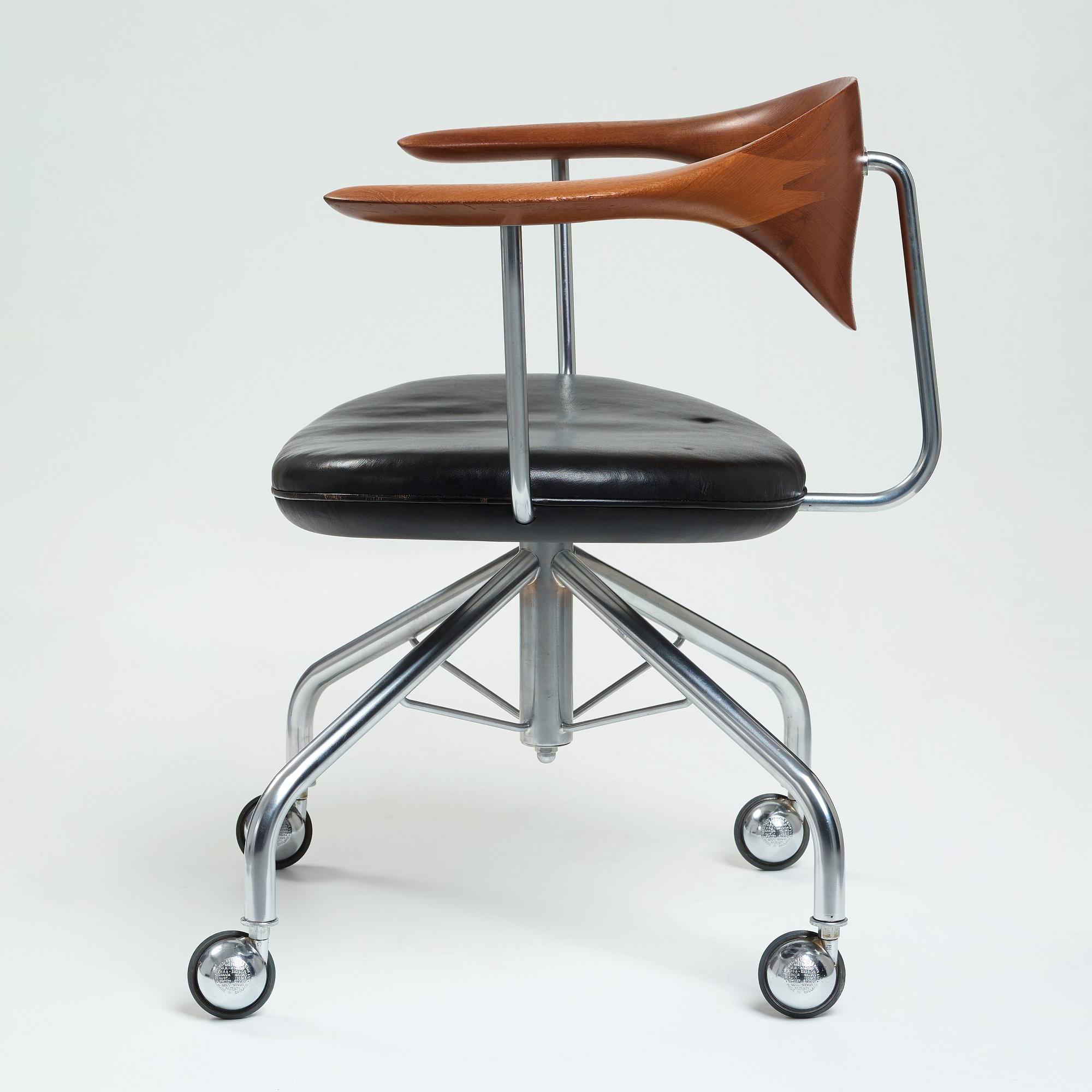 Hans J. Wegner, a "Swivel Chair" /JH502, executed by Johannes Hansen, Denmark 1960's.