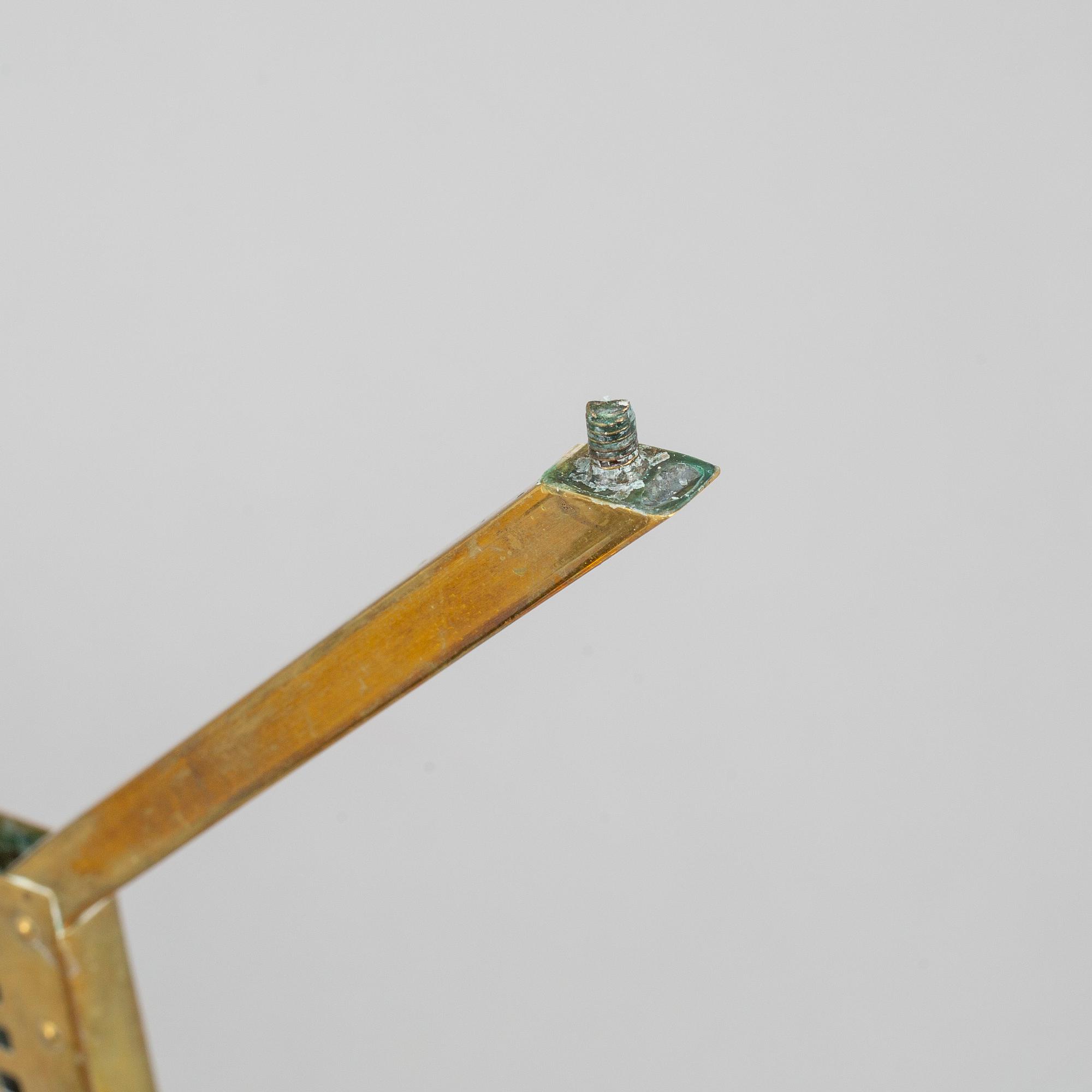 A pair of Art nouveau brass candelabra, early 20th Century.