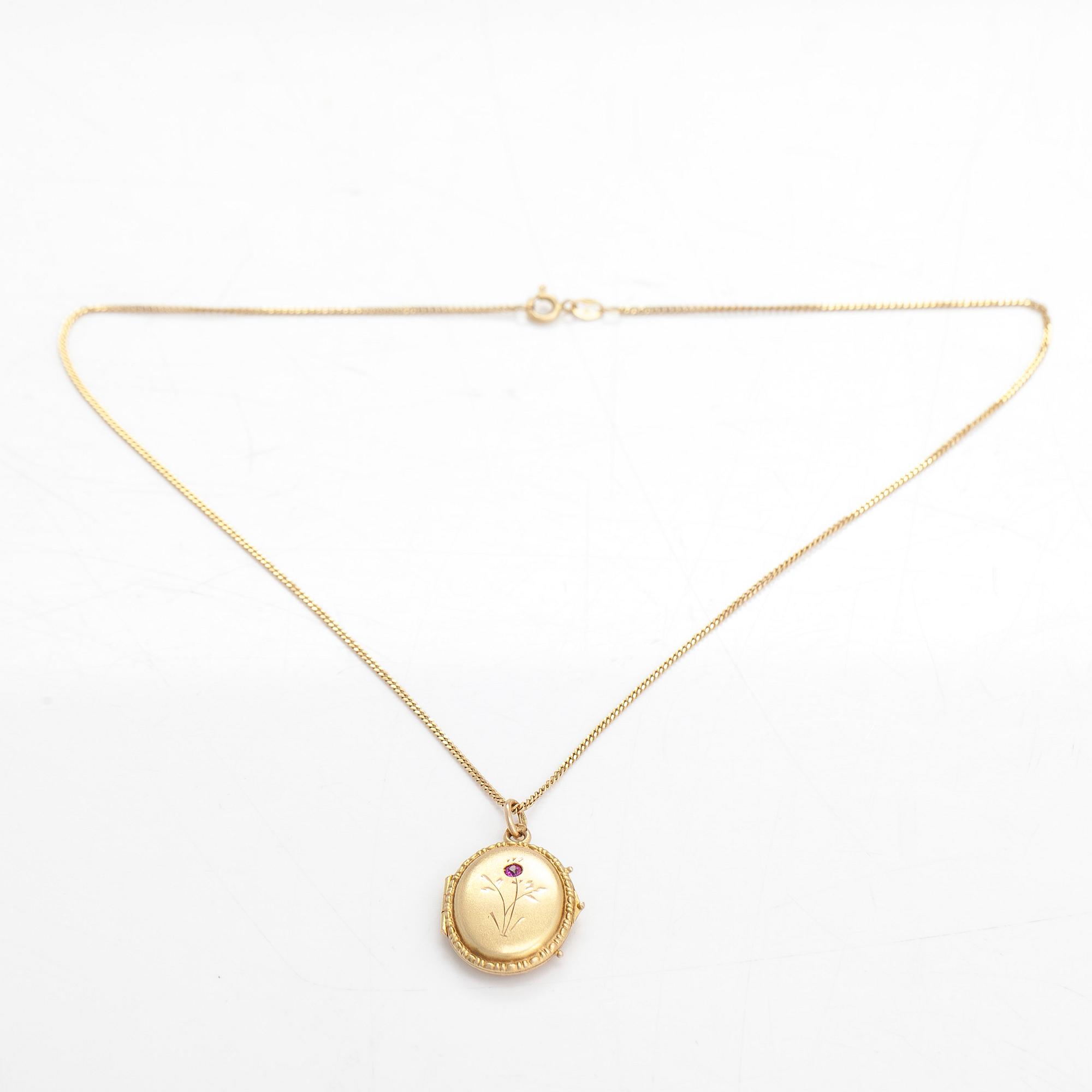 A 14K gold necklace with a locket and a syntetic ruby. Soviet Union.