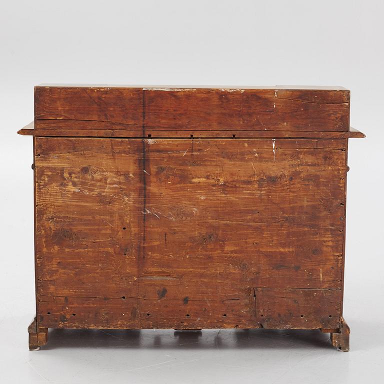 A Swedish late Baroque alder-veneered 'knee-hole' writing desk, first part of the 18th century.