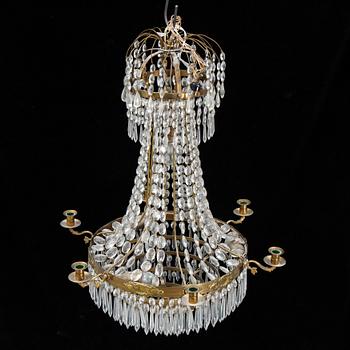 An empire style chandelier. Early 20th Century.