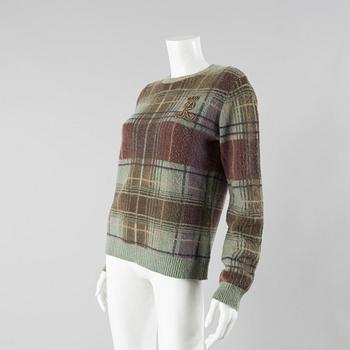 a sweater by Ralph Lauren, in size L.