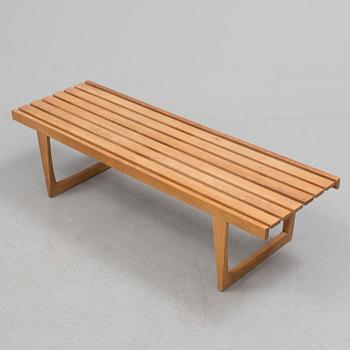 A "Tokyo" bench by Yngvar Sandström for NK.