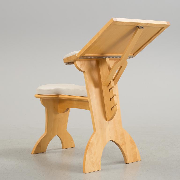 a "plugghästen" chair by Peter Lind.