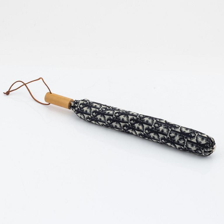 Christian Dior, weekendväska med paraply.