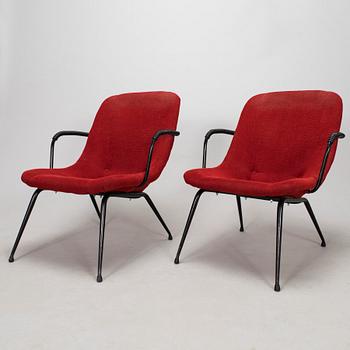 A pair of 1950s armchais.