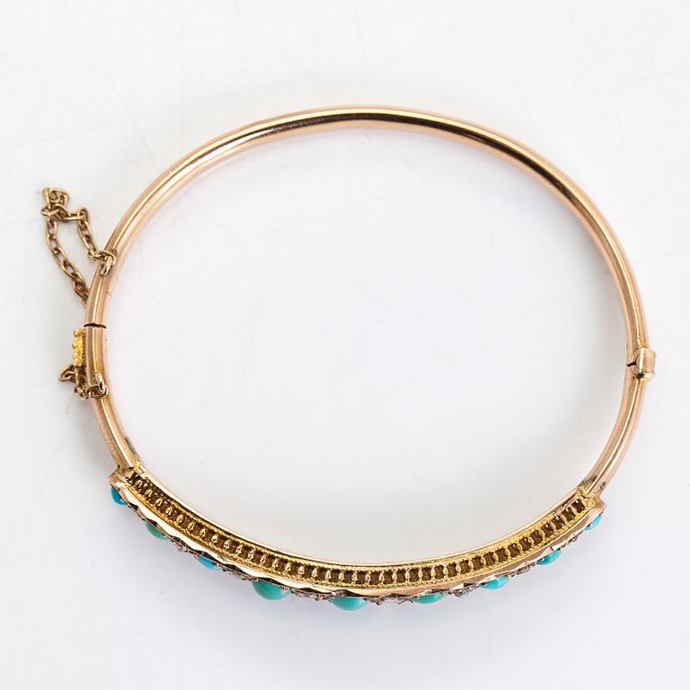 An approximately 9-11K gold bangle, with turquoises and rose-cut diamonds.